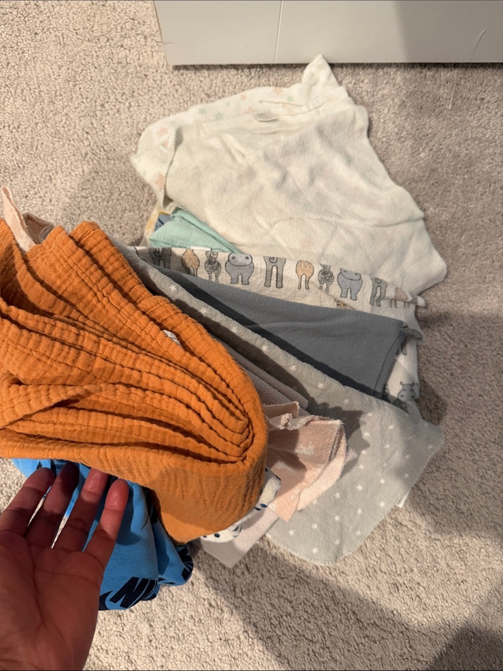 Orange Muslin Swaddle + Mixed Baby Blankets